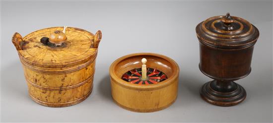A 19th century treen miniature roulette box, and two further treen boxes